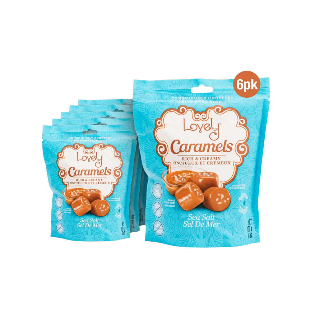 Two Lovely Candy Company sea salt caramel candies with creamy caramel and a sprinkle of sea salt on top.