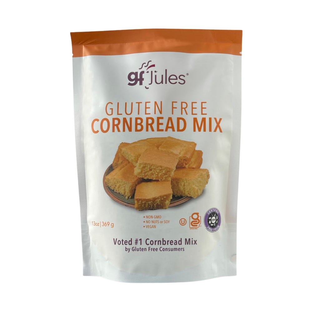 gfJules gluten-free cornbread mix in a box with a prepared cornbread slice on a plate, ready to serve.