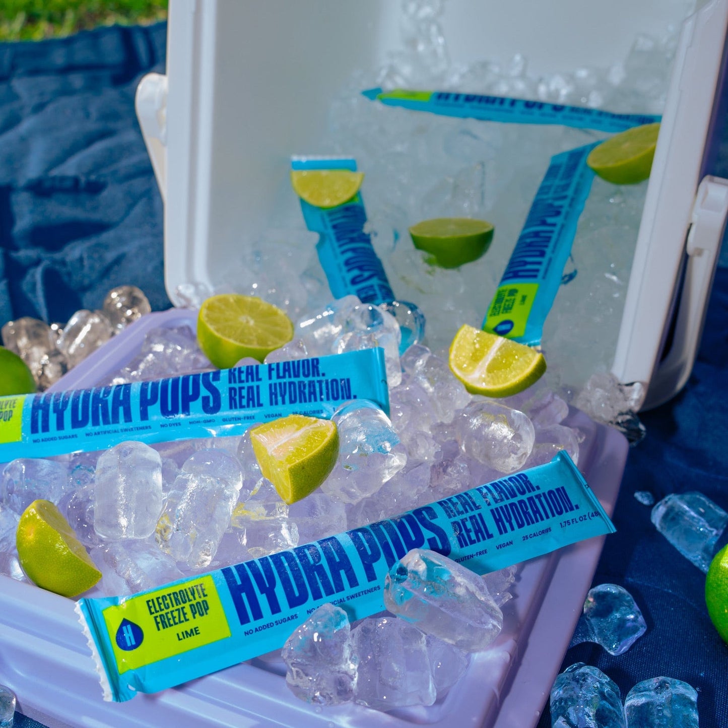 Hydra Pops Lime flavored hydrating popsicle by Hydra Hydration, showing a green lime-colored frozen treat on a stick.