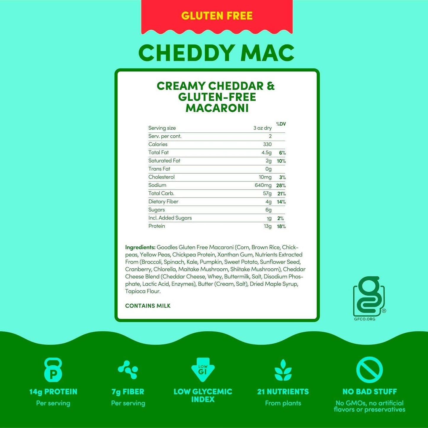 Bowl of GOODLES Cheddy Mac cheesy pasta with vibrant yellow cheese sauce and crispy topping, served on a white plate.