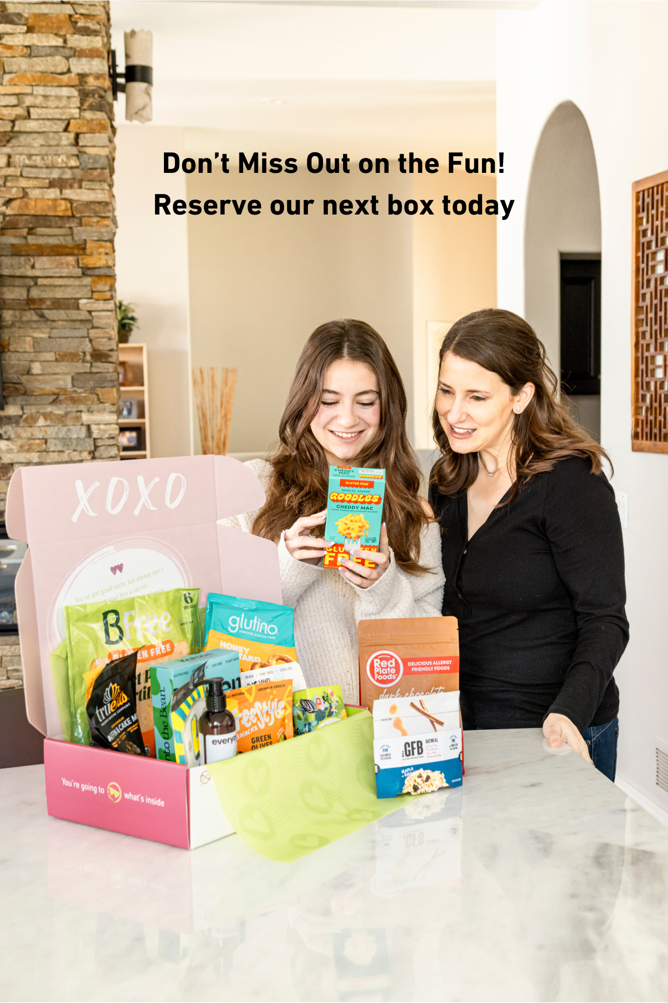 Love Me Gluten Free dairy-free and gluten-free monthly subscription box with assorted snacks and treats.