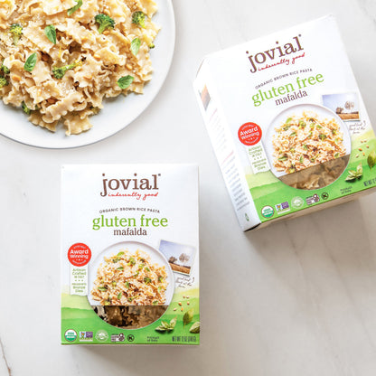 Three boxes of Jovial gluten-free brown rice mafalda pasta from Jovial Foods, Inc, showcasing the product packaging.