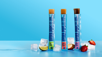 Hydra Hydration The Hydra Duo drops and pops in a clear bottle with colorful candies and hydration supplements, perfect for on-the-go hydration.