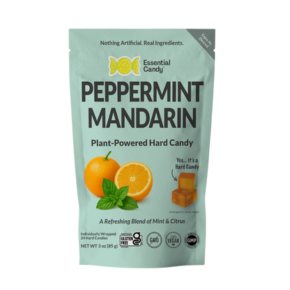 Essential Candy Peppermint Mandarin botanical lozenges in a clear hard candy form, featuring red and white swirls.