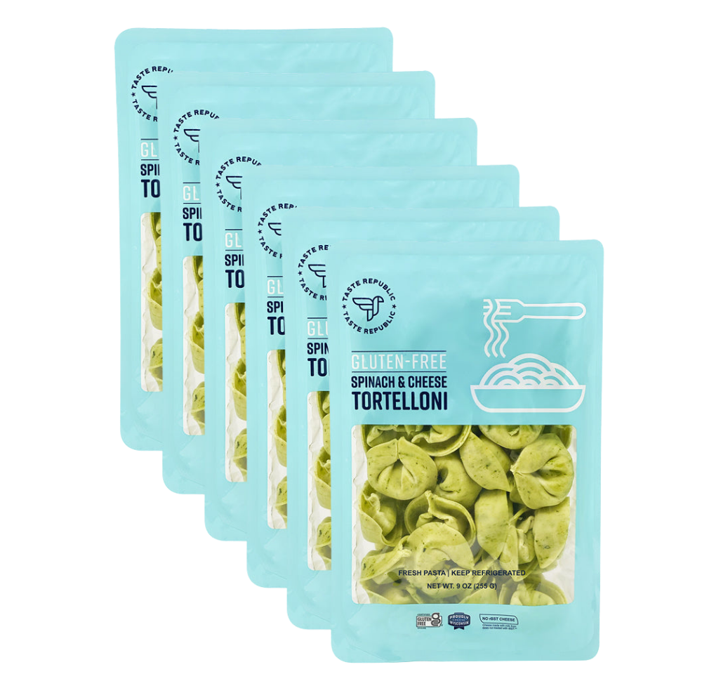 Fresh gluten-free spinach and cheese tortelloni pasta from Taste Republic Gluten-Free, showing uncooked tortelloni with spinach and cheese filling.