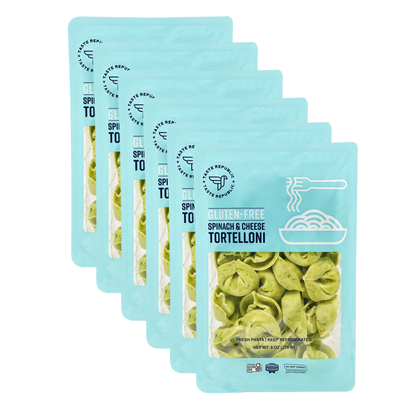 Fresh gluten-free spinach and cheese tortelloni pasta from Taste Republic Gluten-Free, showing uncooked tortelloni with spinach and cheese filling.