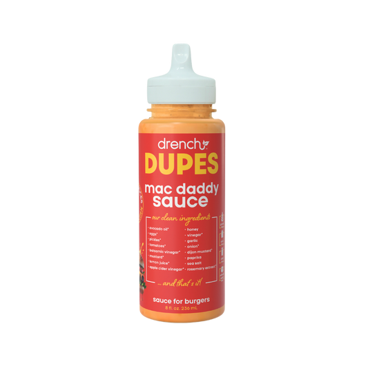 Drench Mac Daddy Sauce bottle with label, showcasing the spicy barbecue flavor and vibrant branding on a white background.