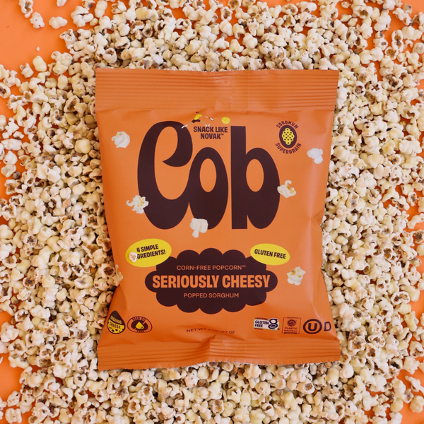 Cob Foods Seriously Cheesy popped sorghum snack in a bowl, showcasing cheesy, crunchy popcorn-like texture from the Cob brand.