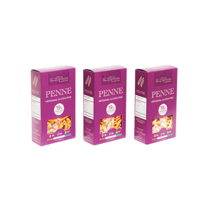 Flower Chef Foods high protein penne pasta pack of 3, showcasing uncooked pasta with a golden yellow color and smooth texture.
