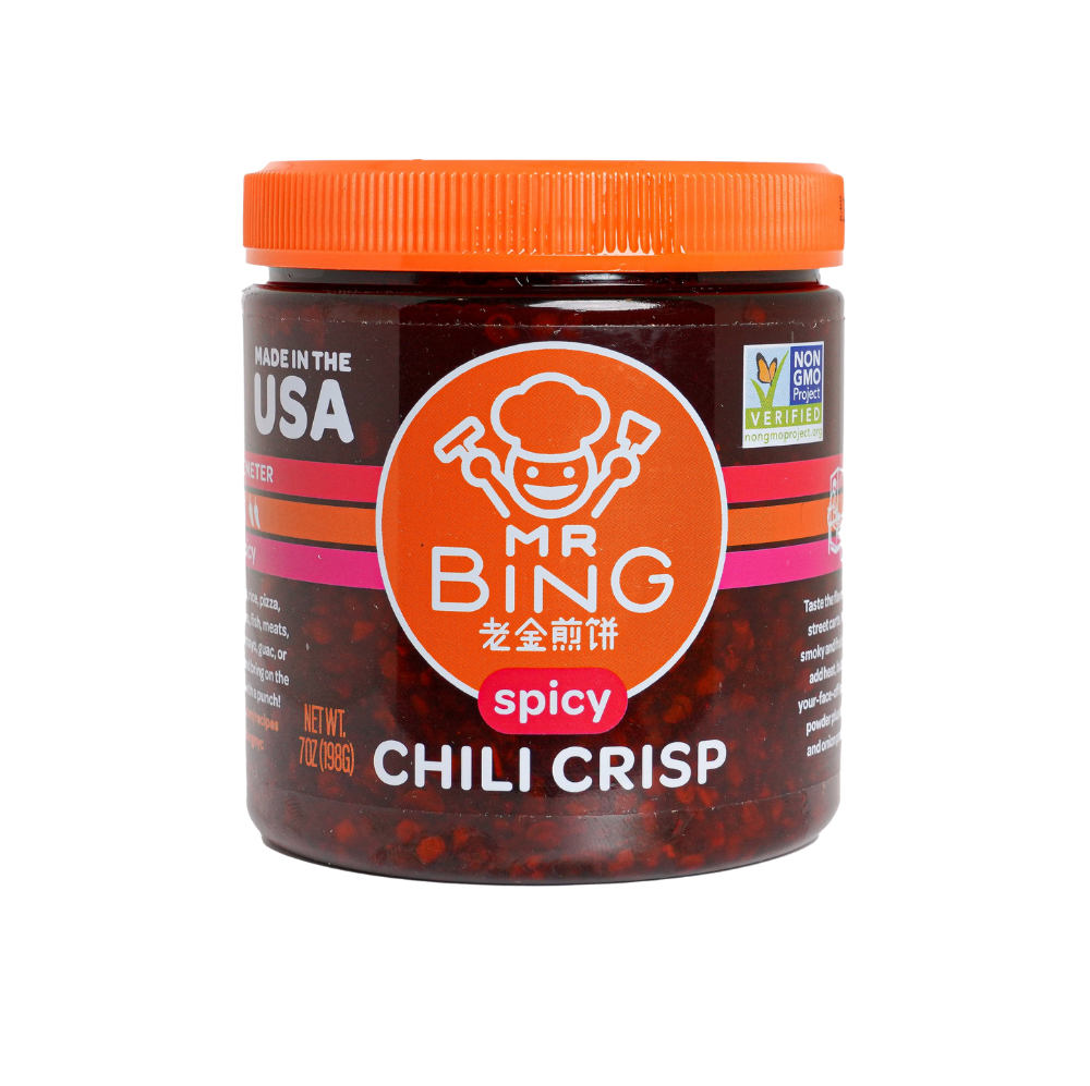 Jar of Mr Bing Chili Crisp spicy sauce from Mr Bing Foods, 7 oz bottle with red chili and crispy oil chunks visible