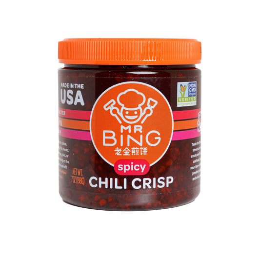 Jar of Mr Bing Chili Crisp spicy sauce from Mr Bing Foods, 7 oz bottle with red chili and crispy oil chunks visible