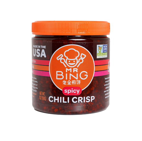 Jar of Mr Bing Chili Crisp spicy sauce from Mr Bing Foods, 7 oz bottle with red chili and crispy oil chunks visible