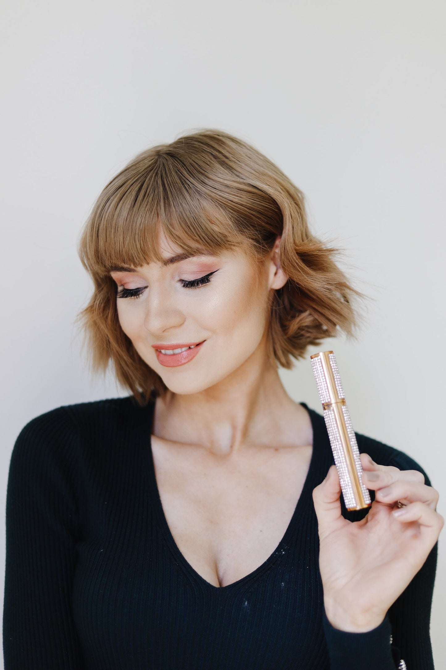 EpiLynx Mega Volume Vegan Mascara with handmade diamond case, showing the black mascara wand and packaging.