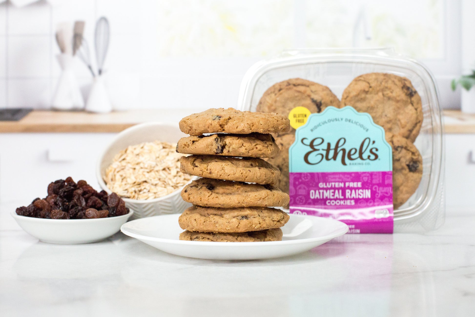 Ethel's Baking Company oatmeal raisin cookies on a plate, showing golden cookies with raisins and a soft, chewy texture.
