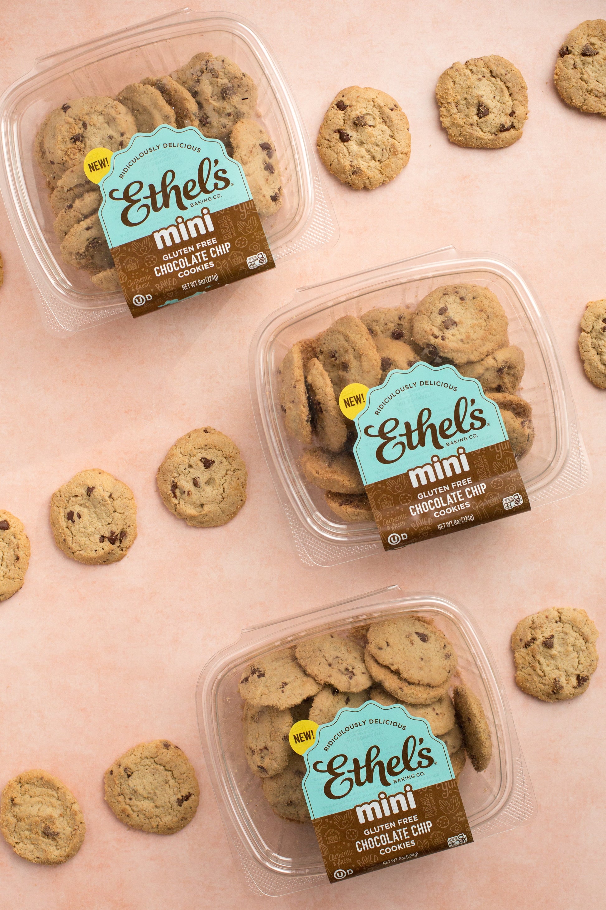 Two mini chocolate chip cookies from Ethel's Baking Company on a white background, showing golden-brown cookies with chocolate chips.