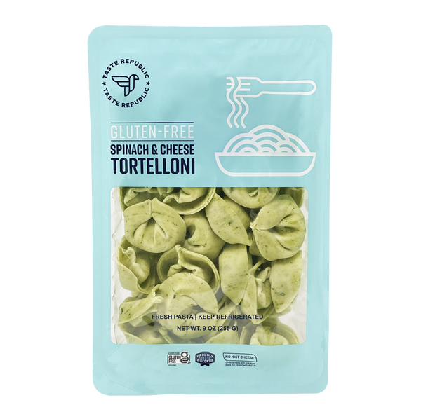 Taste Republic gluten-free spinach and cheese tortelloni pasta in a 6-pack, featuring fresh, uncooked tortelloni on a white background.