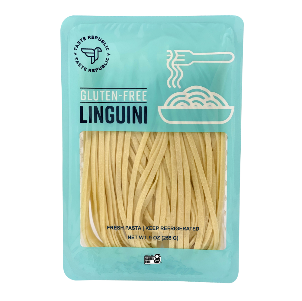 Fresh gluten-free linguini pasta from Taste Republic Gluten-Free 6-pack, showcasing uncooked, neatly arranged pasta strands.