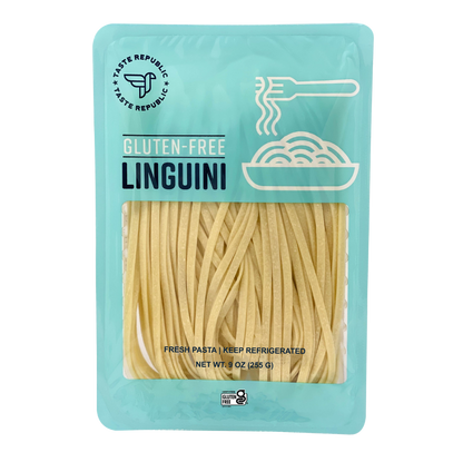 Fresh gluten-free linguini pasta from Taste Republic Gluten-Free 6-pack, showcasing uncooked, neatly arranged pasta strands.