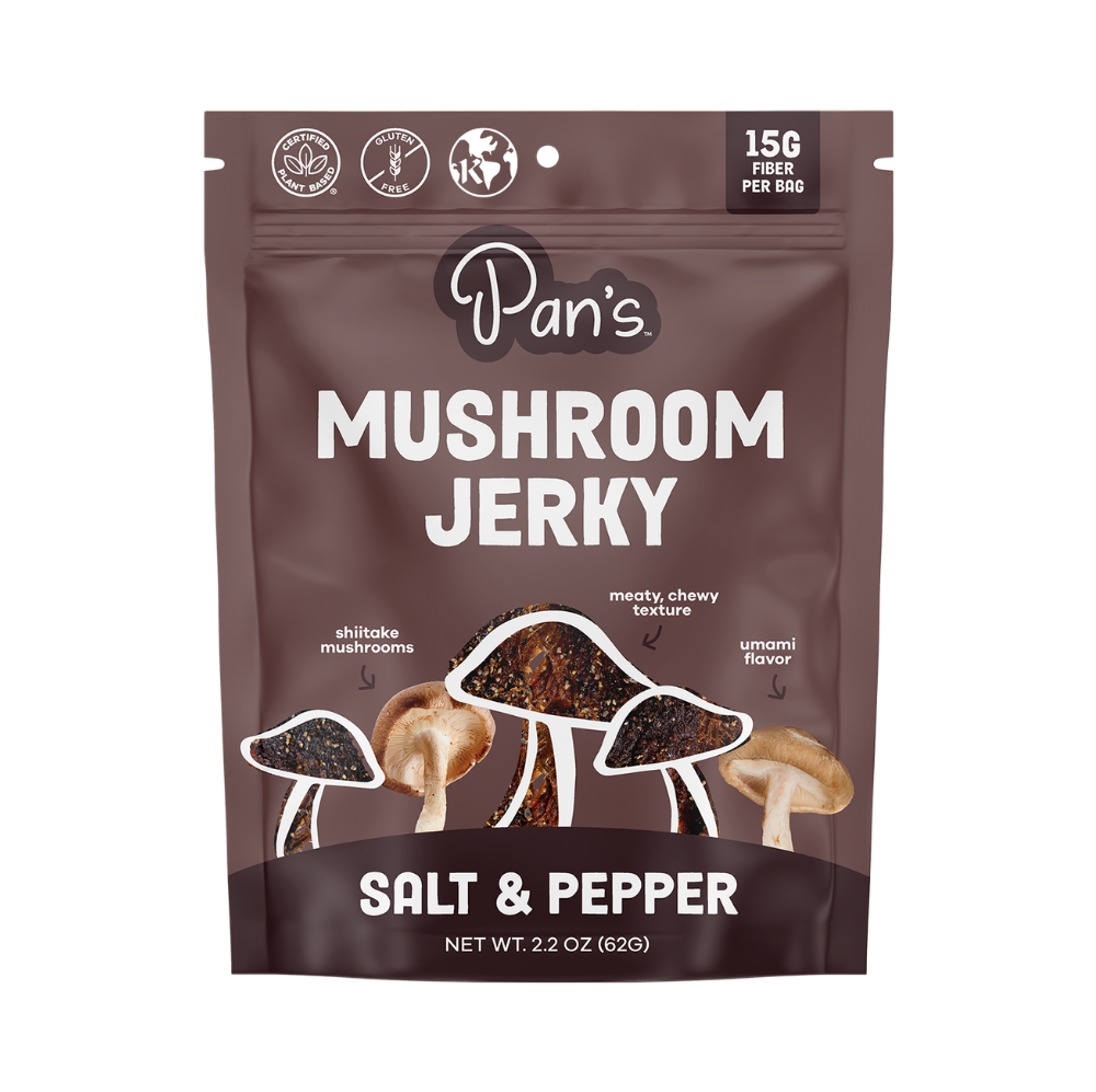 Pan's Mushroom Jerky salt and pepper mushroom jerky slices in a clear package, showcasing the seasoned mushroom snack.