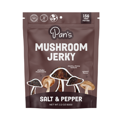Pan's Mushroom Jerky salt and pepper mushroom jerky slices in a clear package, showcasing the seasoned mushroom snack.