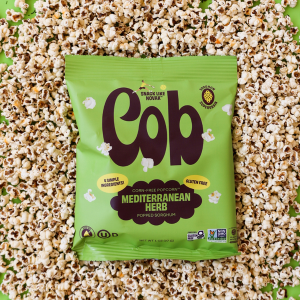 Cob Foods Mediterranean Herb Popped Sorghum in a bowl, showcasing crunchy, herb-seasoned popped sorghum pieces.