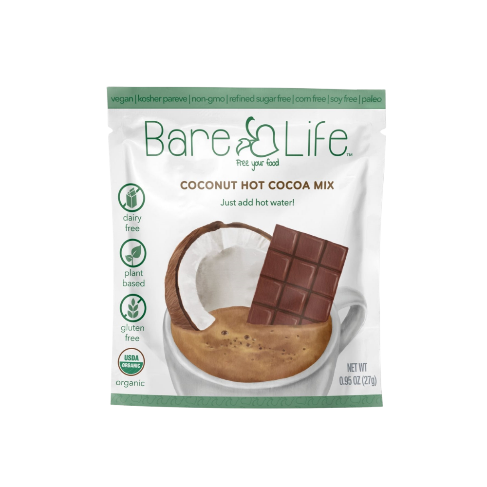 Bare Life dairy-free coconut hot cocoa mix packets, 20-pack, with chocolate powder and coconut flavor in individual sachets.