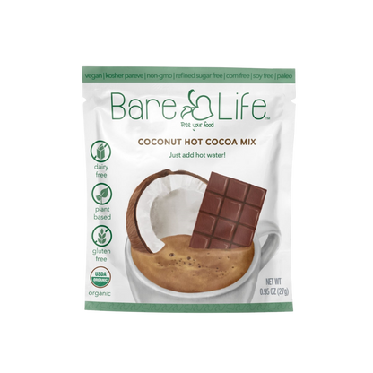 Bare Life dairy-free coconut hot cocoa mix packets, 20-pack, with chocolate powder and coconut flavor in individual sachets.