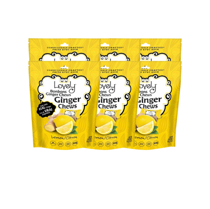 Two Lovely Candy Company Lemon Ginger Chews displayed on a white surface, showcasing their bright yellow and ginger-flavored appearance.