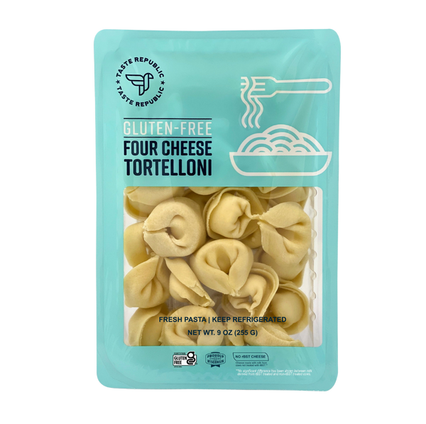 Taste Republic gluten-free four cheese tortelloni pasta in a 6-pack, showcasing fresh, uncooked pasta with cheese filling.