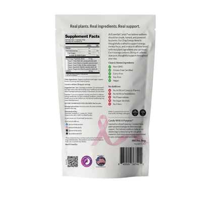 Two bottles of Essential Candy Zing Energy™ Botanical Lozenges herbal supplements with colorful packaging and botanical illustrations.