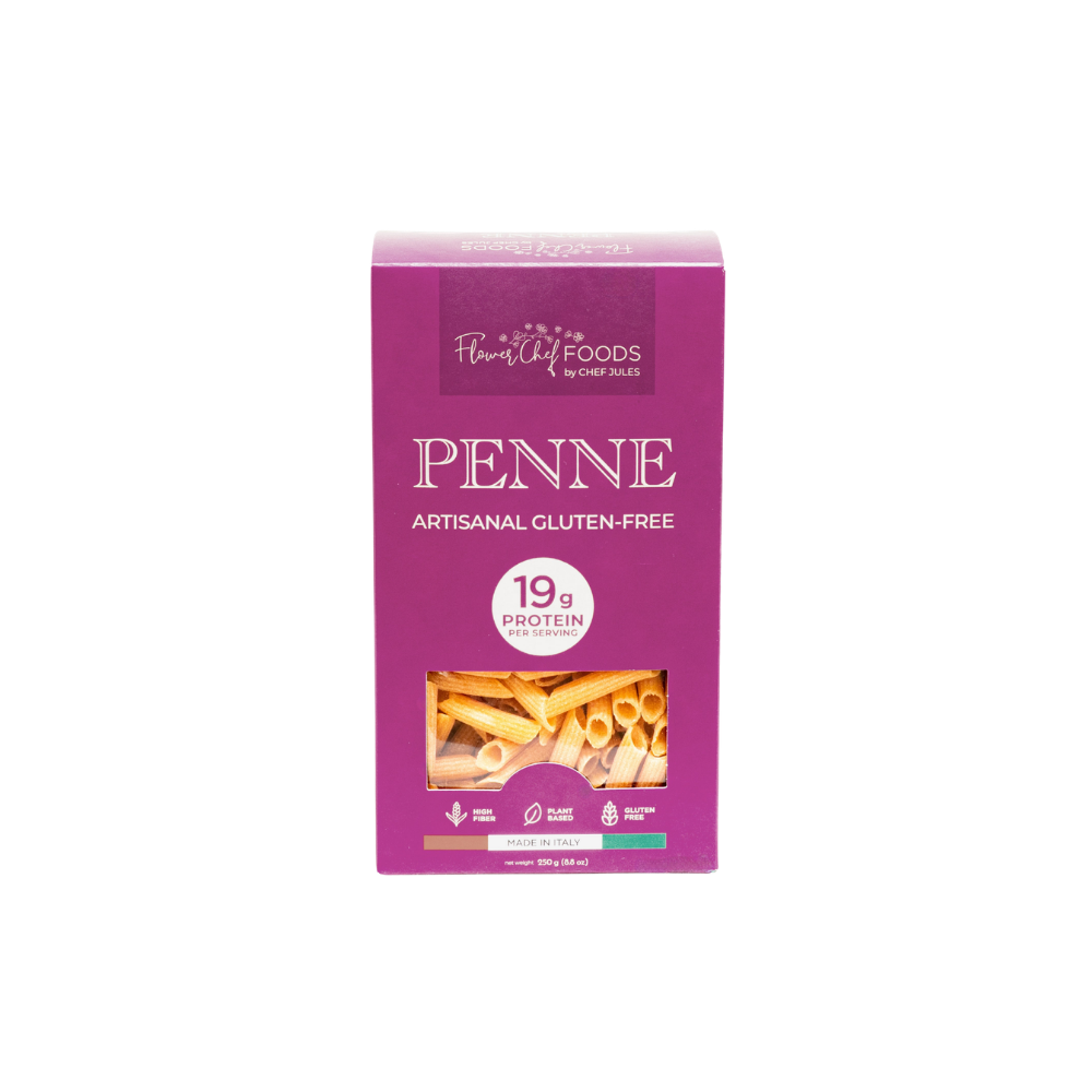 High protein Flower Chef Foods penne pasta pack of 3, showcasing uncooked whole wheat pasta in a clear view.