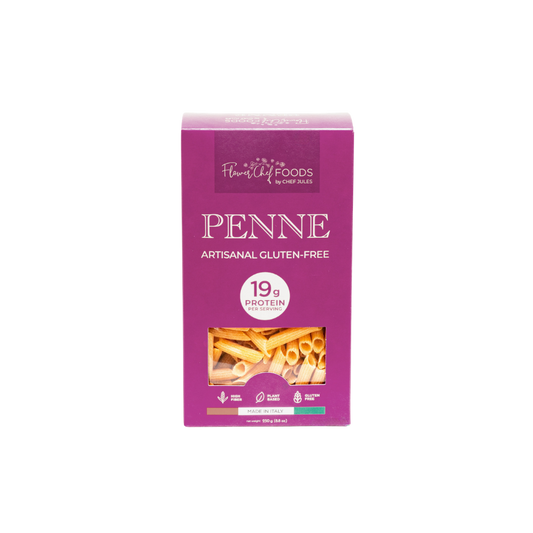 High protein Flower Chef Foods penne pasta pack of 3, showcasing uncooked whole wheat pasta in a clear view.