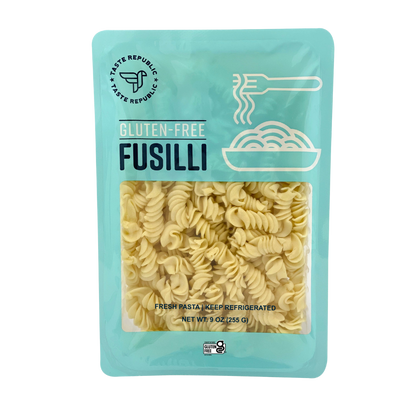 Taste Republic gluten-free fusilli pasta in a 6-pack, showcasing spiral-shaped pasta on a white background.