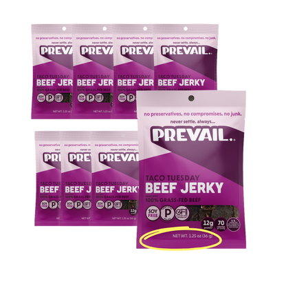 PREVAIL Jerky Taco Tuesday beef jerky single-serve pack, 1.25 oz, displayed in an 8-pack, with visible beef jerky pieces and packaging.