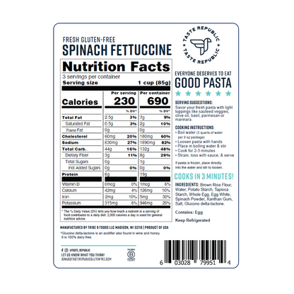 Taste Republic gluten-free spinach fettuccine pasta pack with six fresh, green, uncooked spinach fettuccine noodles on a white background.