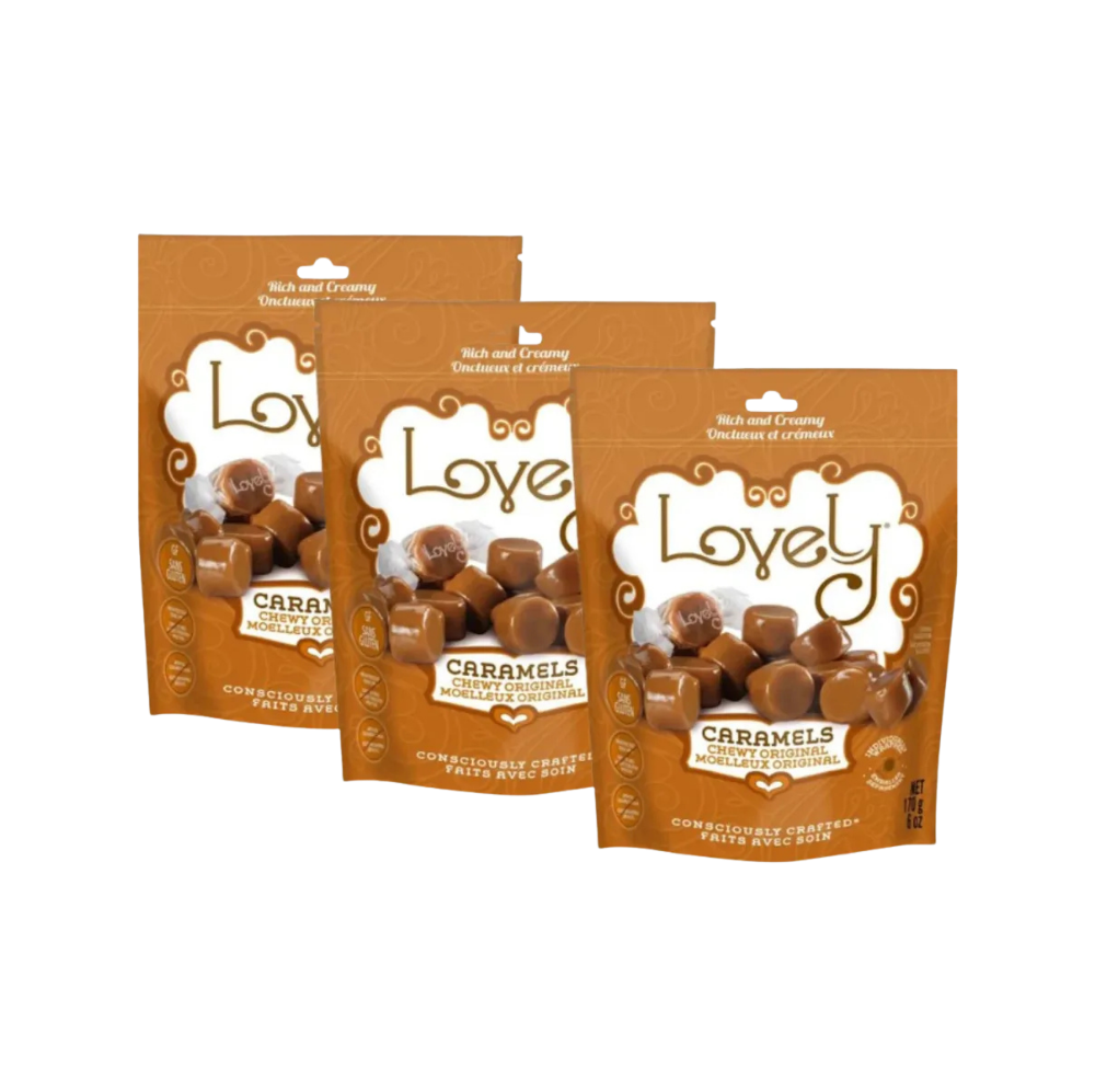 Assorted Lovely Candy Original Caramels displayed in a clear bowl, showcasing smooth, golden-brown caramel pieces.