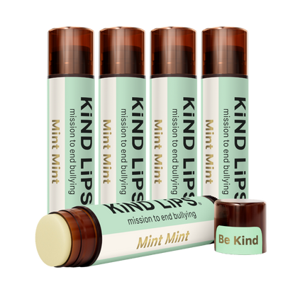 Kind Lips Mint Mint organic lip balm tube with clear label, featuring a refreshing mint flavor and natural ingredients.