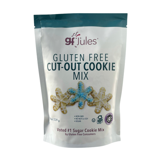 gfJules gluten-free cut-out cookie mix package with decorated cookies and baking tools on a wooden surface.