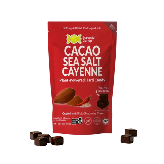 Essential Candy Cacao Sea Salt & Cayenne botanical hard candies in a clear glass jar, showing the colorful lozenge assortment.