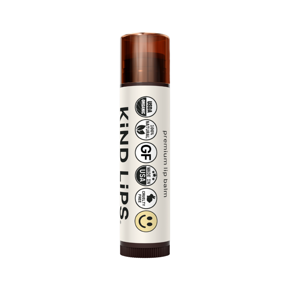 Set of five organic Kind Lips lip balms in colorful tubes, showcasing variety pack with different flavors and natural ingredients.