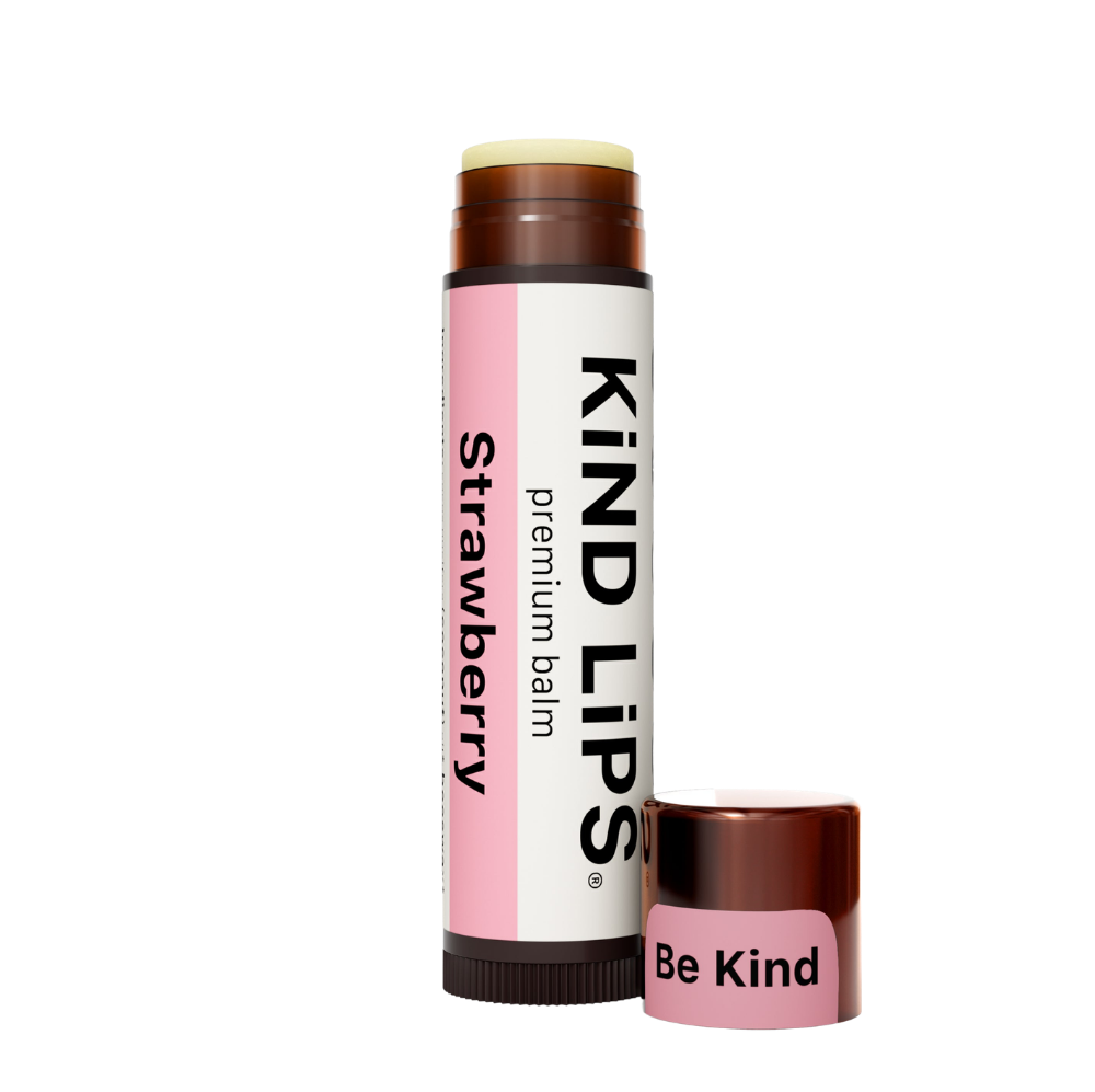 Kind Lips Strawberry Organic Lip Balm tube with label, showing the natural, berry-flavored lip care product.