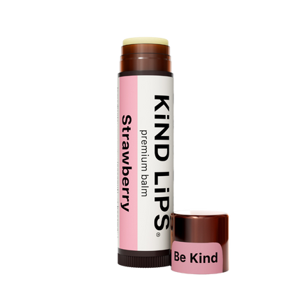Kind Lips Strawberry Organic Lip Balm tube with label, showing the natural, berry-flavored lip care product.