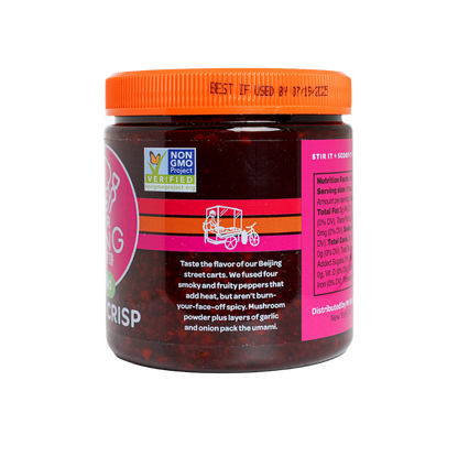 Jar of Mr Bing Chili Crisp spicy sauce by Mr Bing Foods, 7 oz, with vibrant red chili oil and crispy chili flakes visible inside.