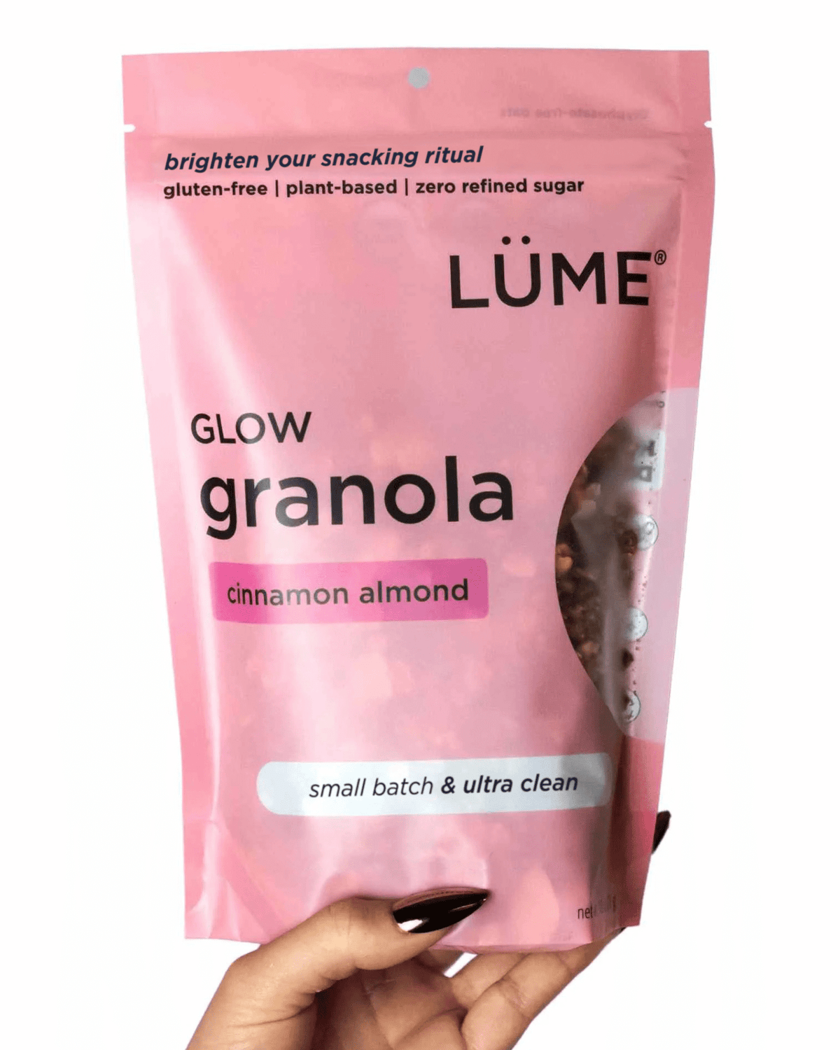 LÜME Cinnamon Almond Granola in a package, featuring cinnamon and almond ingredients