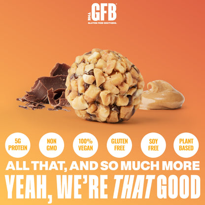 The GFB Dark Chocolate Peanut Butter Bites in a clear container, showing bite-sized peanut butter and dark chocolate snack pieces.