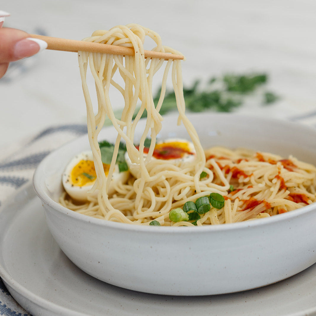 Clean Monday Meals Ramen Noodles in a bowl with broth, vegetables, and noodles, showcasing a delicious, ready-to-eat ramen dish.