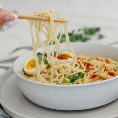Clean Monday Meals Ramen Noodles in a bowl with broth, vegetables, and noodles, showcasing a delicious, ready-to-eat ramen dish.