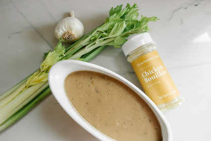 Clean Monday Meals chicken bouillon seasoning jar with label, used for enhancing soups and dishes.