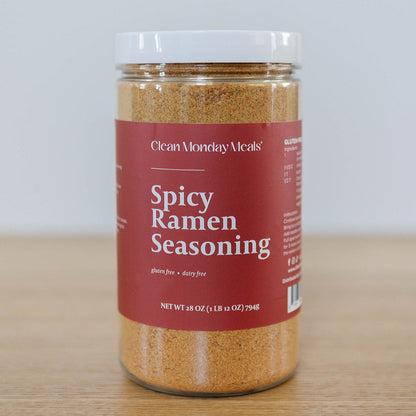 Spicy ramen seasoning packet from Clean Monday Meals with vibrant red and orange packaging, ready for flavor enhancement.
