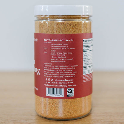 Spicy ramen seasoning packet from Clean Monday Meals, featuring bright red and orange packaging with bold flavor labels.